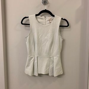 White peplum top